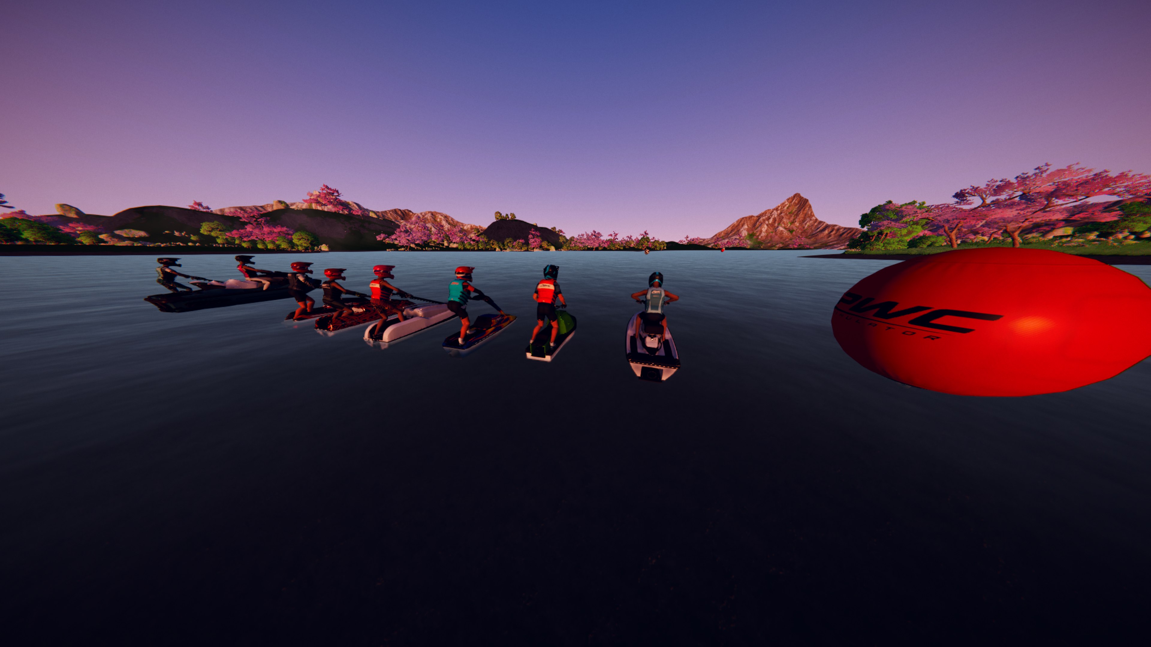 Riders lined up beside a course buoy before a race